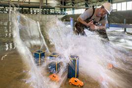 Researchers at Oregon State University, Corvallis, unleash tsunamis in a wave basin.